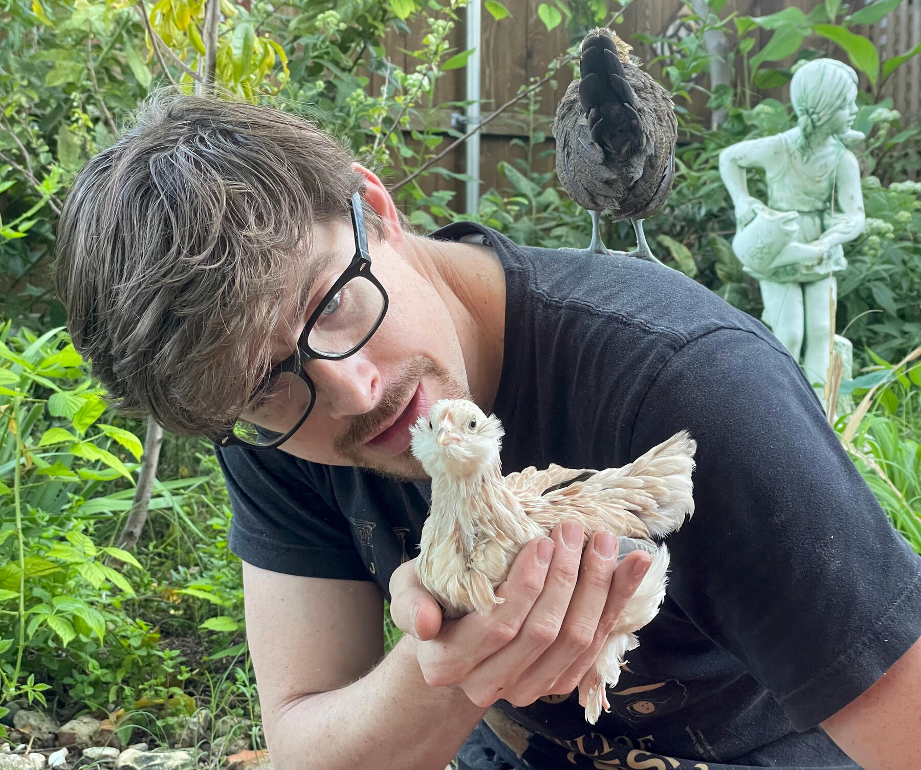 Doug with Birds Chickens are Songbirds too